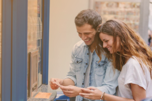 excited couple with lottery tickets ID 487361187