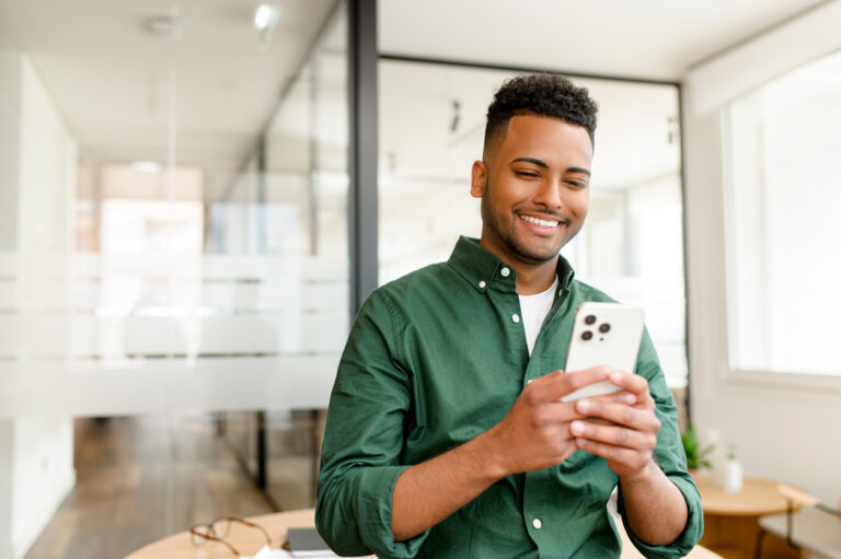 young male doing research on phone