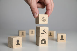 Wooden blocks with law and settlement concepts